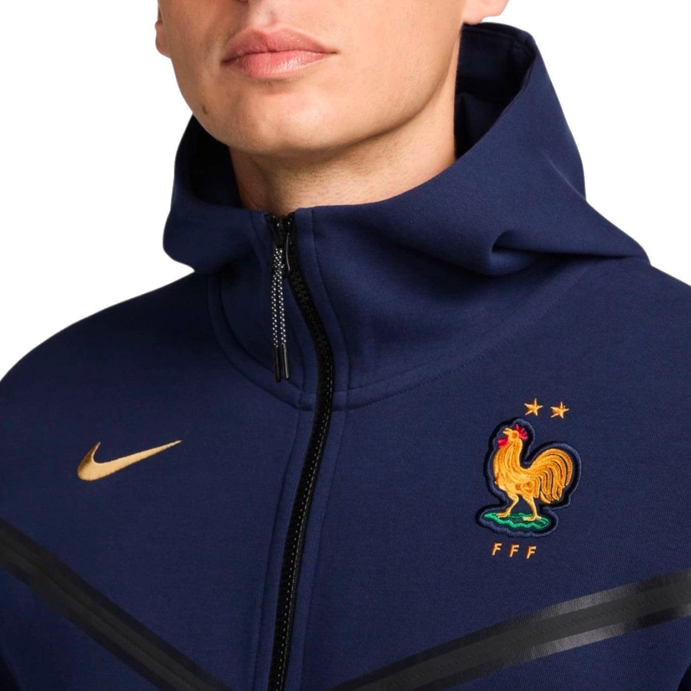 nike-france-tech-fleece-soccer-jacket-2024-chest-closeup-crest-gold-swoosh-1.jpg nike-france-tech-fleece-soccer-jacket-2024-chest-closeup-crest-gold-swoosh-1.jpg